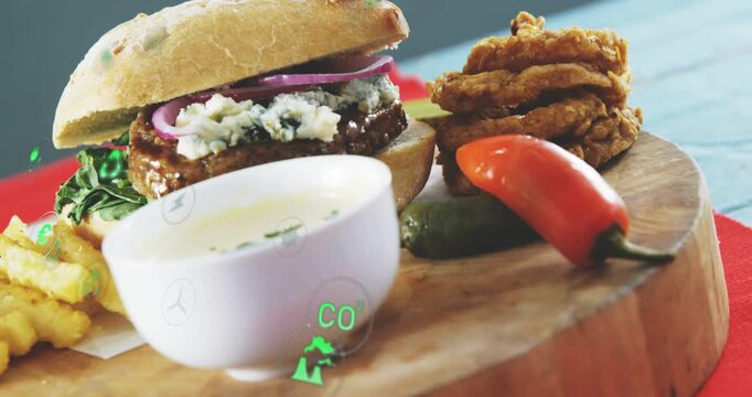 Camera pulling back, revealing burger meal while green eco icons floating, showing sustainability