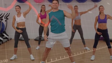 Trainer cueing fitness sidebend routine, leading class mirroring twists while HUD charting metrics