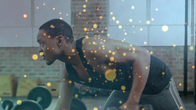 Man entering frame grabbing dumbbell, doing single arm rows for fitness with golden overlay