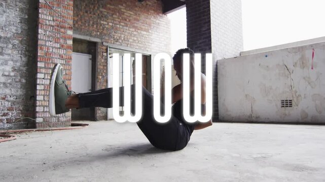 Male athlete holding med ball in V-sit twisting, white WOW overlay obscuring man, building fitness