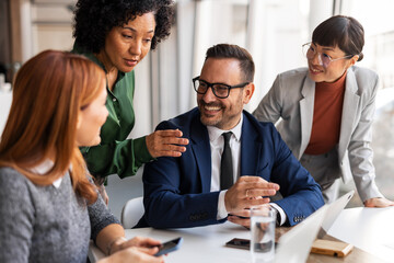 Professional Team Collaborating in a Modern Office Setting