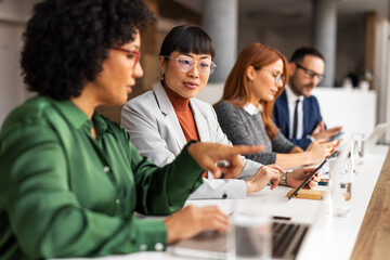 Professional Team Discussing Ideas in a Modern Office Setting