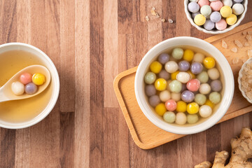 Colorful sweet glutinous rice balls tangyuan in sweet ginger syrup soup
