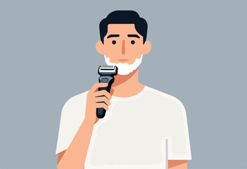 A man shaves his face with an electric razor, he is wearing a white tee and his face has a white foam