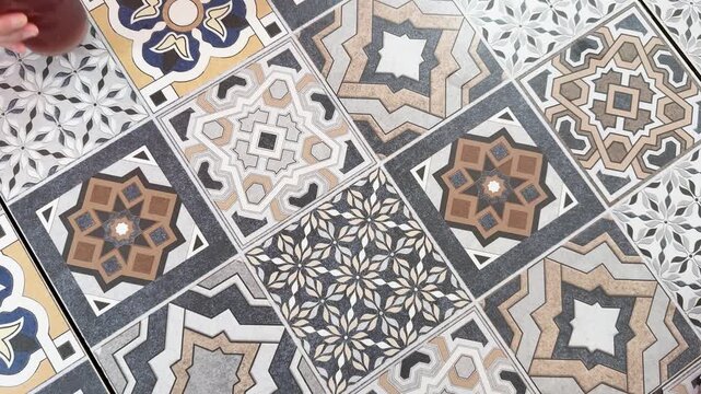 Hands Grabbing Iced Drinks from Patterned Tile Table in Phuket