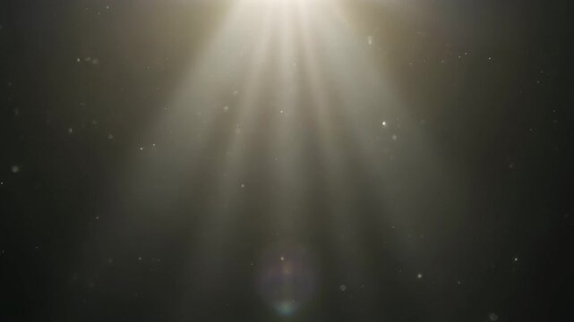 Dust particles illuminated by light rays, a captivating footage of atmospheric phenomenon