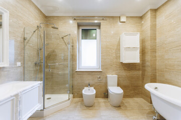 exclusive bathroom in upscale suite showcases generous marble space with contemporary amenities