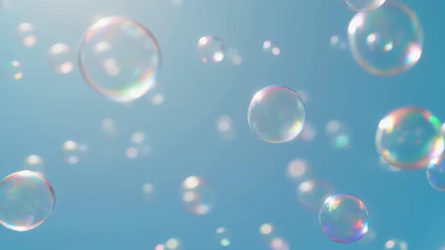 Close-up footage of floating soap bubbles against a bright blue sky, symbolizing joy and lightness