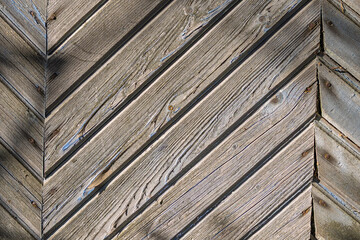 textured wooden surface consisting of a variety of wooden planks. the texture of old wood with...