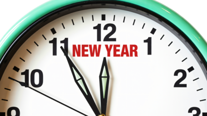 A close up of a clock striking midnight on new year's eve celebration
