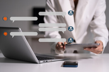 Businesswoman uses artificial intelligence chatbots automatically respond online messages to help customers instantly.
