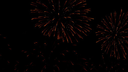 Amazing real beautiful colorful fireworks background on celebration night event for happy new year party, Abstract Multi color golden firework in the night sky