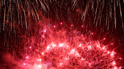 Amazing real beautiful colorful fireworks background on celebration night event for happy new year party, Abstract Multi color golden firework in the night sky