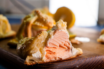 Puff pastry with salmon. Fish pastry. Food concept.
