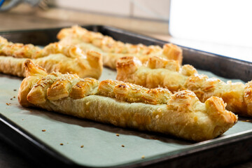Puff pastry with strawberry jam. Jam-filled pastries. Food concept.