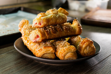 Puff pastry with strawberry jam. Jam-filled pastries. Food concept.