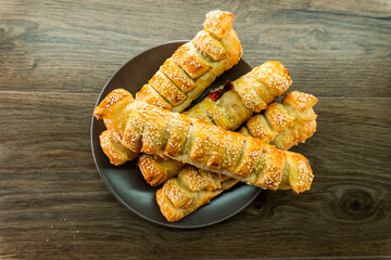 Puff pastry with strawberry jam. Jam-filled pastries. Food concept.