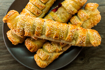 Puff pastry with strawberry jam. Jam-filled pastries. Food concept.