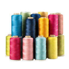 Colorful spools of thread arranged in a pyramid shape on black background for sewing
