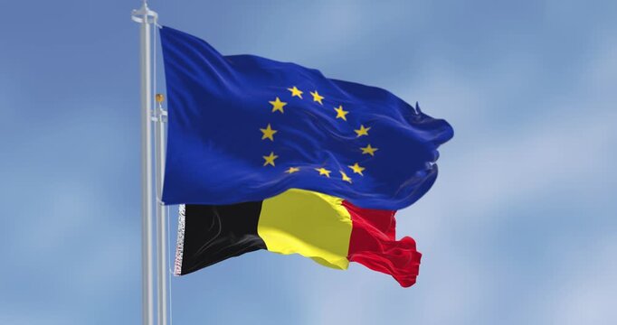 Belgium national flag and European Union flag waving in the wind - Powered by Adobe