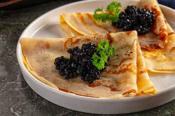 luxury pancake with black caviar