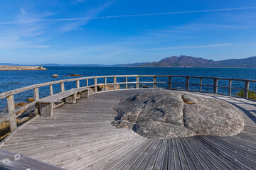 A scenic viewpoint with a wooden deck