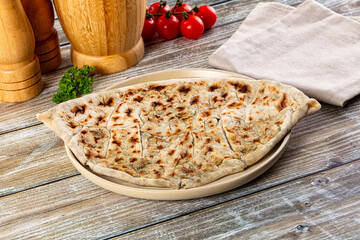 Turkish Kutab staffed green herbs