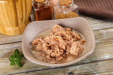 Canned tuna fish in the bowl