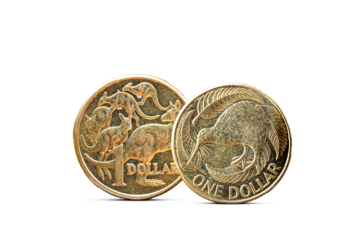Australian Dollar Coin Next to New Zealand Dollar Coin