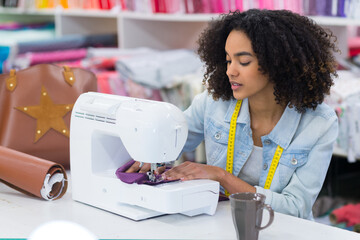 young dressmaker at work