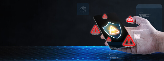 Hand holding smartphone with glowing shield and warning triangles on screen, symbolizing critical ai security risk, potential data breach and mobile cybersecurity threat in digital networks