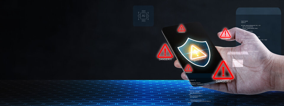 Hand holding smartphone with glowing shield and warning triangles on screen, symbolizing critical ai security risk, potential data breach and mobile cybersecurity threat in digital networks - Powered by Adobe