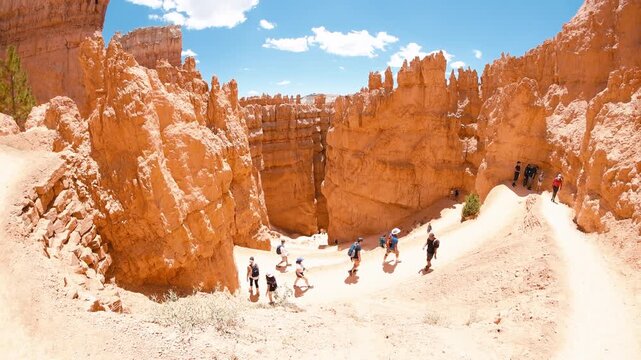 BRYCE CANYON, UT - JULY 2019: Tourists along the main trail in summer season