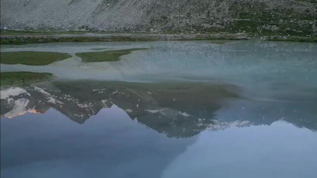 Moiry Glacier Sunrise Orbit Right Reveal Lake and Mountains