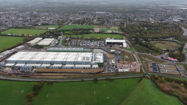 Aerial drone video of a large new-build data center in Waltham Cross, UK, showcasing expanding digital infrastructure designed to meet rising AI-driven computing and cloud processing demands.