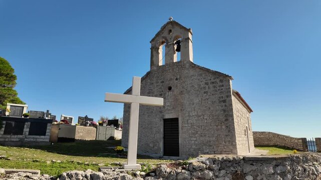 Sunny day at the Church of St. Pelegrin in Savar on Dugi Otok, Croatia. Peaceful coastal setting with bright Adriatic scenery and island charm.