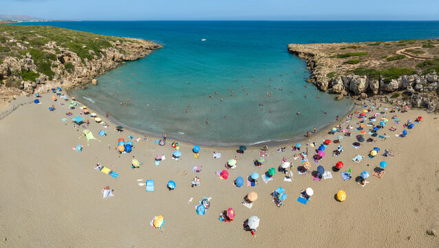 Aerial panoramic view of Cala Mosche (or Calamosche) beach, a beautiful sandy beach within the Vendicari Nature Reserve, near Noto, Sicily, Italy. It's famous for its crystal clear and blue waters.