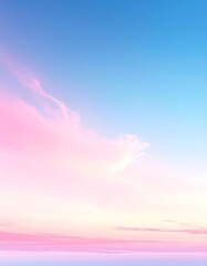 A serene sky at dawn or dusk, featuring a beautiful gradient of soft blue and pastel pink hues with delicate clouds.
