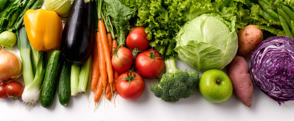 A colorful assortment of fresh vegetables including leafy green lettuce, bright orange carrots, glossy red tomatoes, deep purple eggplant, crunchy cucumbers, yellow bell pepper