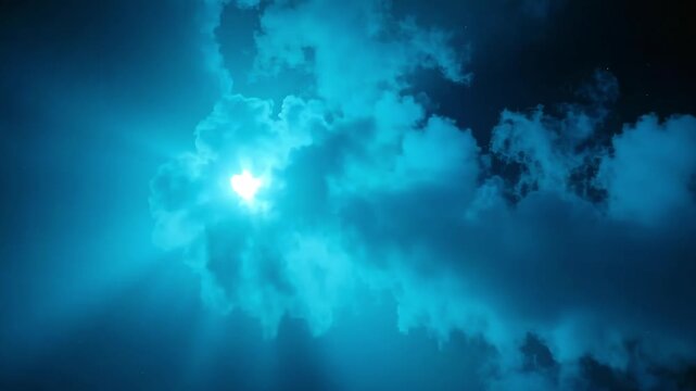 Dynamic motion of vibrant blue clouds illuminated by ethereal light piercing through a deep night sky backdrop