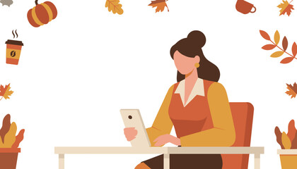 Businesswoman working on tablet at desk with coffee and autumn seasonal elements