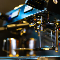 close-up image of the coffee machines that are operating automatical Coffee flowing into coffee cup that is prepar for service Coffee aroma bake the whole shop and the shop atmosphere that look warm