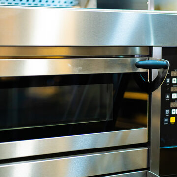 A modern oven for baking pizza in a restaurant. High quality photo