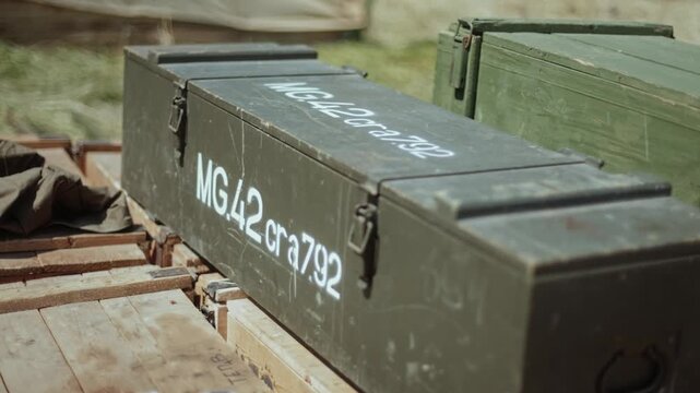 Close up of German wooden ammunition box, 'MG42 cra792' on lid. Holds cartridges for MG 42 machine gun. Wehrmacht army equipment, World War II.