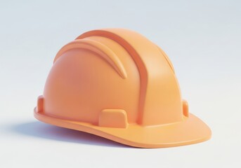 Fototapeta premium Orange protective headgear rests against a muted light background