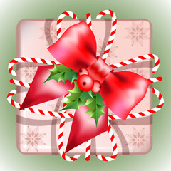 Christmas pink gift box with red bow and holly berries.