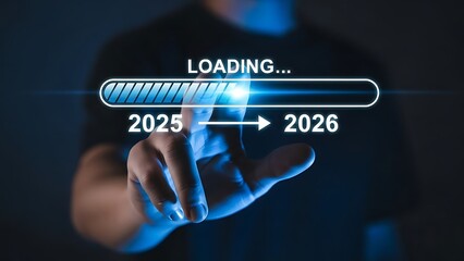 Hand touching loading bar transitioning from 2025 to 2026 with blue glow progress
