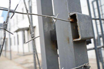 Barbed wire. Metal fencing in prisons, at borders and places of special regime.
