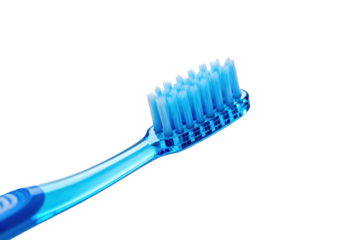 Close-up view of a blue toothbrush with bristles