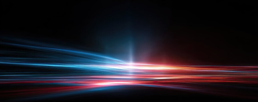 An abstract image featuring streaks of blue, red, and orange light against a black backdrop - Powered by Adobe
